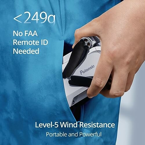 Hand putting compact drone in pocket, text about FAA ID and wind resistance.