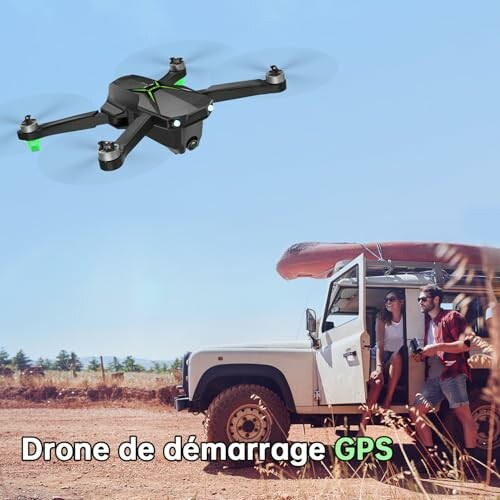 Drone flying over a parked car with people beside it