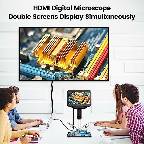 People using HDMI digital microscope with dual screen display.