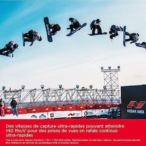 Snowboarder performing a jump sequence with a red banner in the foreground.